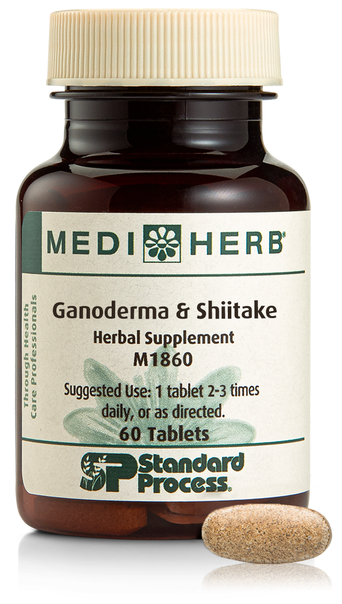 A bottle of Ganoderma &amp; Shiitake herbal supplement next to a tablet.
